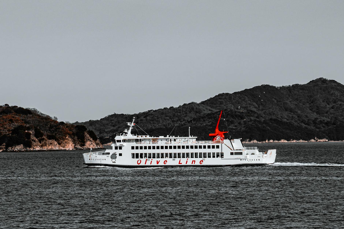Olive Line ferry cruising near Shodoshima island in Seto Inland Sea, Japan.